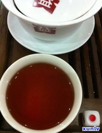 庆沣祥2007年普洱熟茶：2014、2009年价格对比，品质评价及08年工艺生茶饼解析